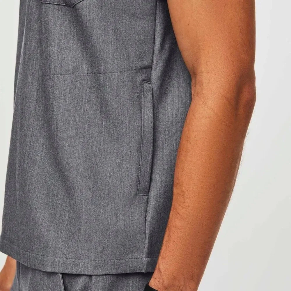 Men’s Chisec‎ Three-Pocket Scrub Top in Graphite Gray.
